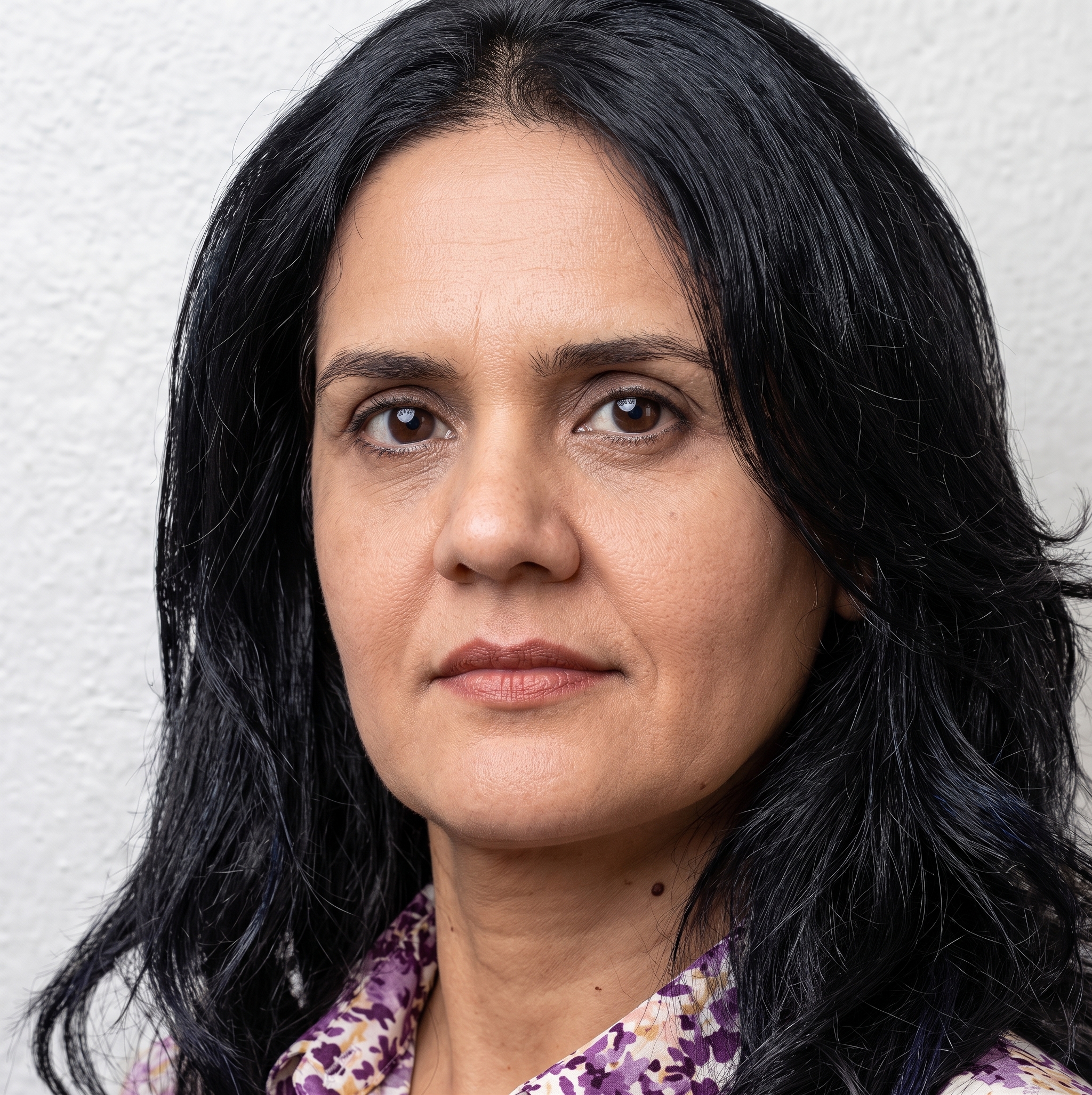 Mme Amira Sghari